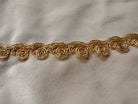 A round, cream-colored tablecloth featuring a dramatic, scalloped border shaped like six large flower petals. The border is intricately embroidered with a coastal motif including pink starfish, seashells, and teal-blue swirling waves. Gold beaded accents line the inner circular seam and the outer edges.
A long, narrow cream runner with matching scalloped, wavy edges. It is adorned with the same nautical embroidery of pink starfish and seashells scattered across the center and concentrated along the edge.