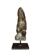 Figural sculpture in the Shona style, Zimbabwe. Two abstracted figures are intertwined, carved from greenish-brown soapstone. Sculpture rests on a dark iron stand.