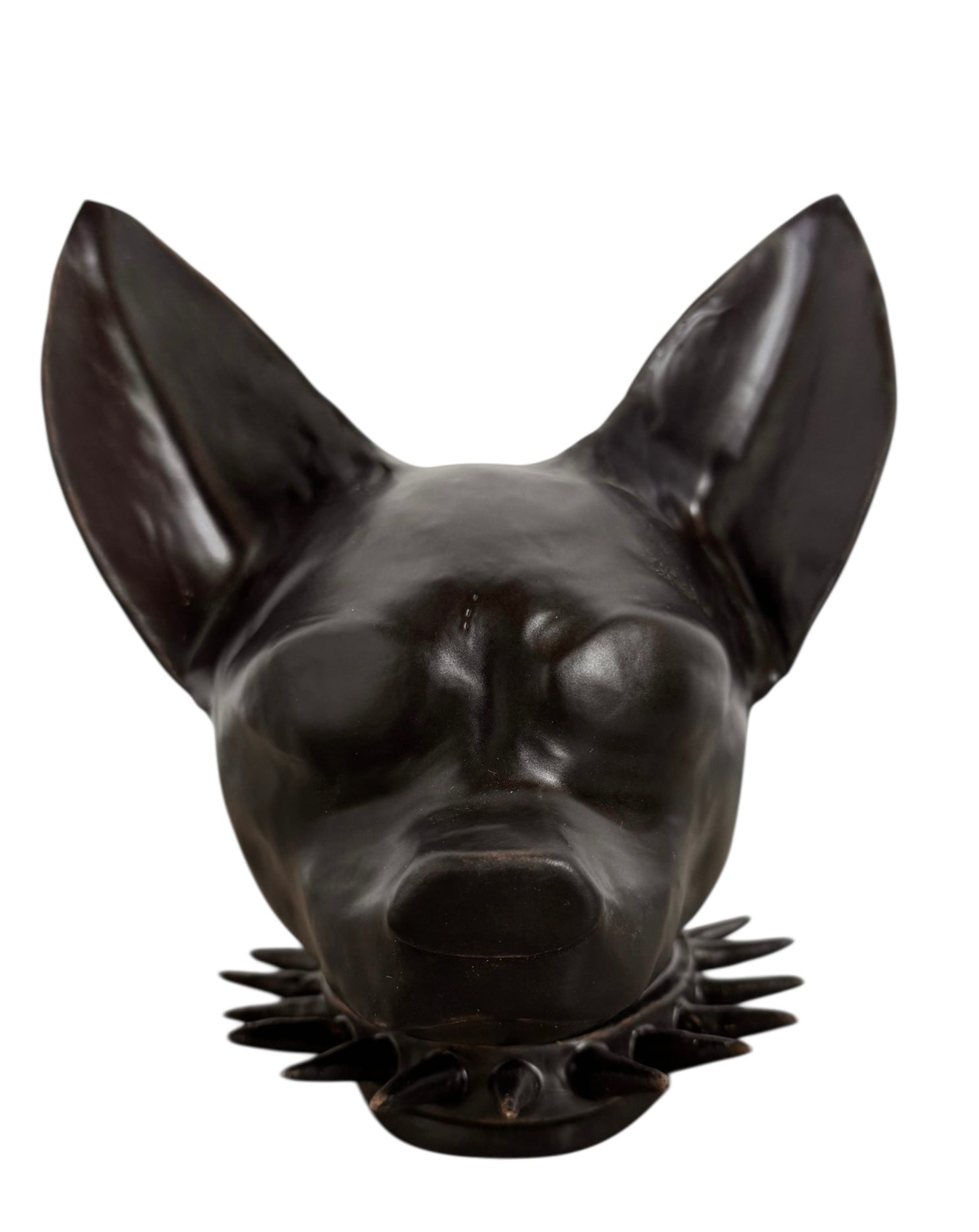 A smooth, dark black-colored ceramic sculpture of a Miniature Pinscher's head. The stylized dog features large, upright pointed ears and a prominent spiked collar around its neck. The surface has a soft sheen, with minimalist indentations for eyes and a rounded snout, creating a sleek and modern aesthetic.