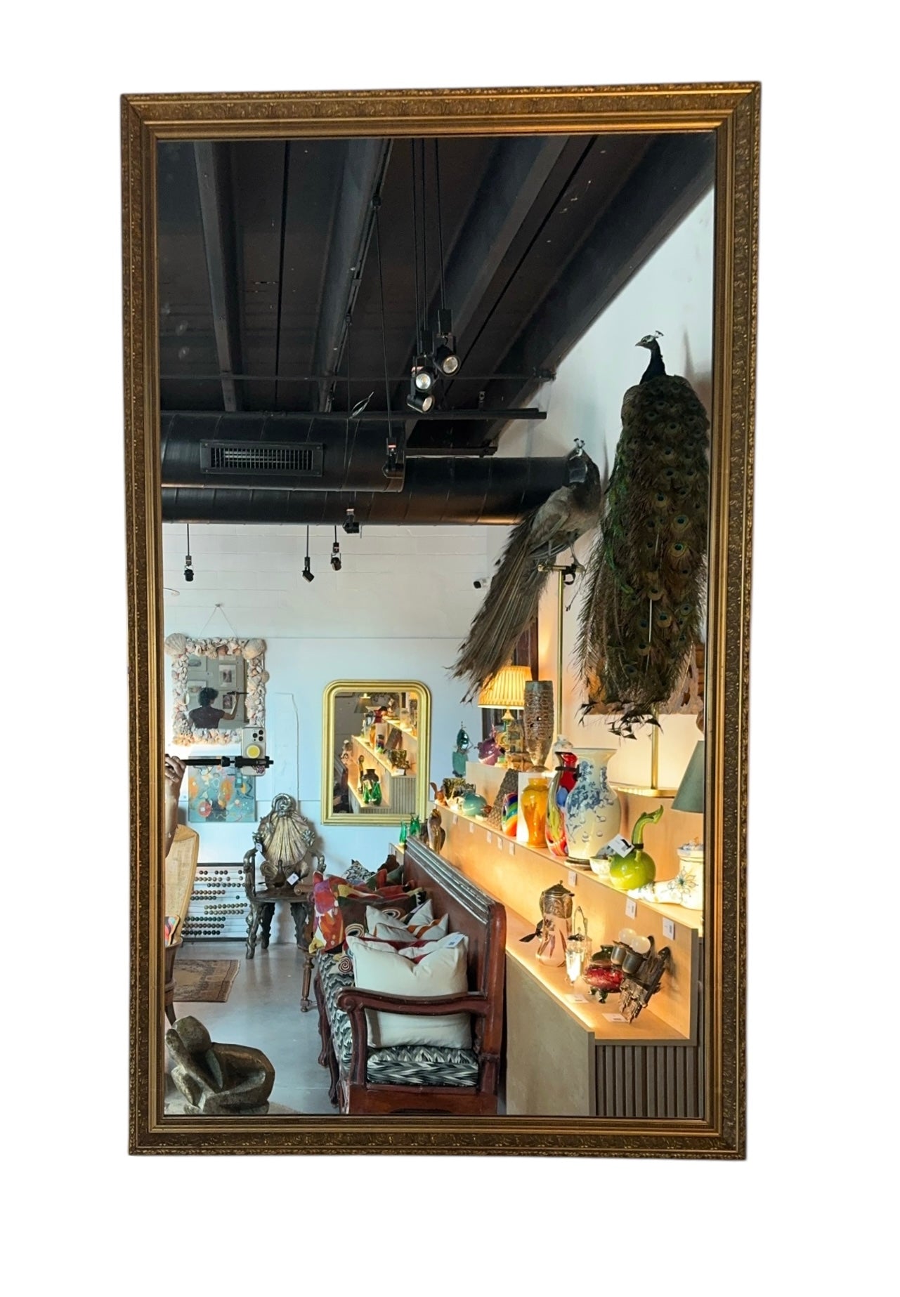 French gilt mirror with ornate frame and timeless elegance. Classic antique style with warm gold finish, excellent condition.