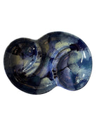 Vintage McCoy ashtray. Glazed in dark blue and marbled with lighter blues. The bottom is stamped 'McCoy USA.'"