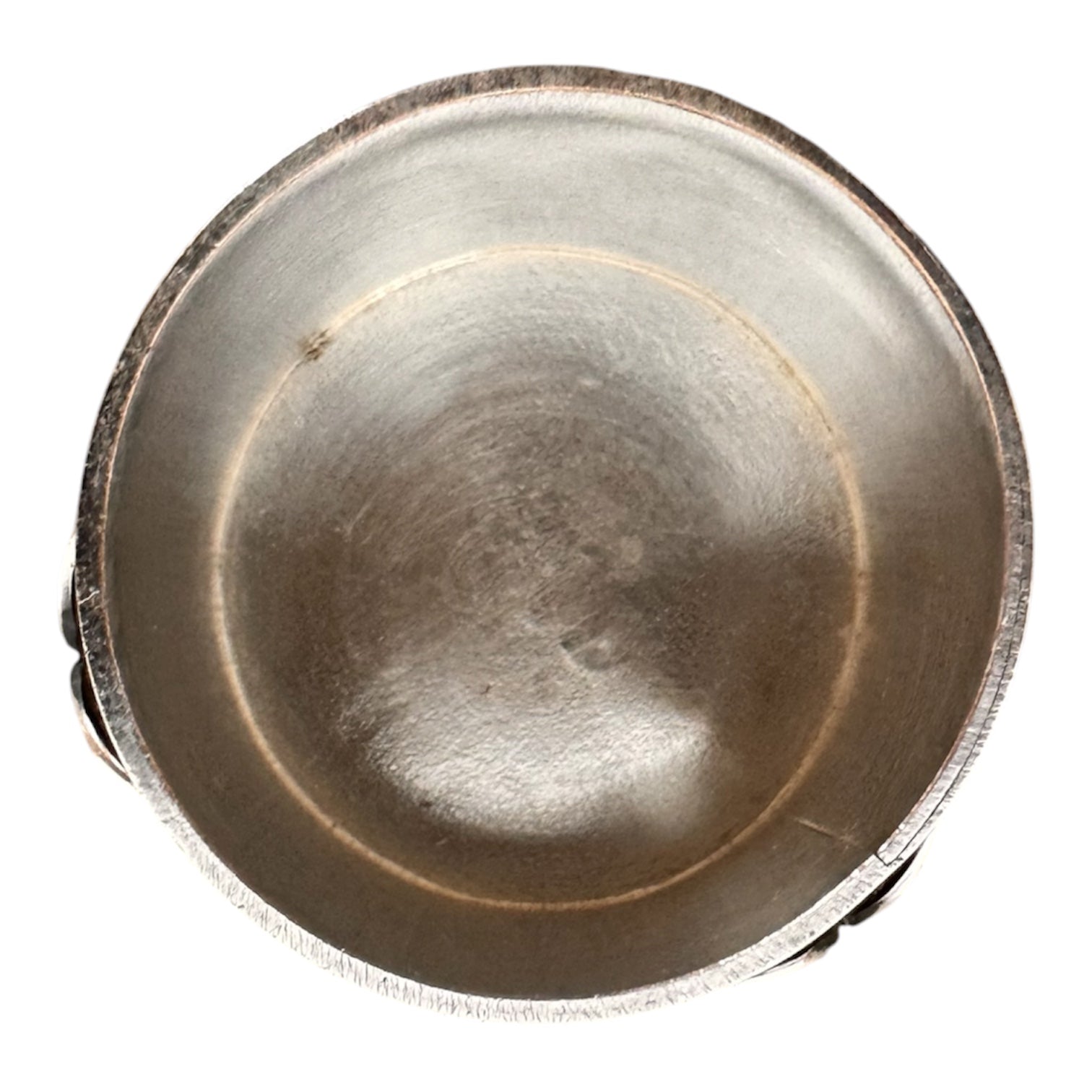 The set includes a large, rectangular, hammered copper tray with geometric openwork handles. Resting on the tray is a tall, slightly tapered copper coffee pot with a wooden handle, a matching smaller creamer pitcher with a similar wooden handle, a lidded sugar bowl, and a tiny matching metal cup or jigger. To the right off the tray sits a large, spherical copper water pitcher or jug with a wide mouth and ice lip.