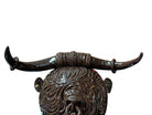 Glossy dark brown ceramic bull sculpture with intricate, hand-incised swirling patterns and a nose ring.