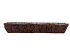 A vintage carved wooden printing block with intricate, repeating patterns, engraved with an unknown artist's signature and stamped "Made in France." The wood shows signs of age and wear, adding to its historical character