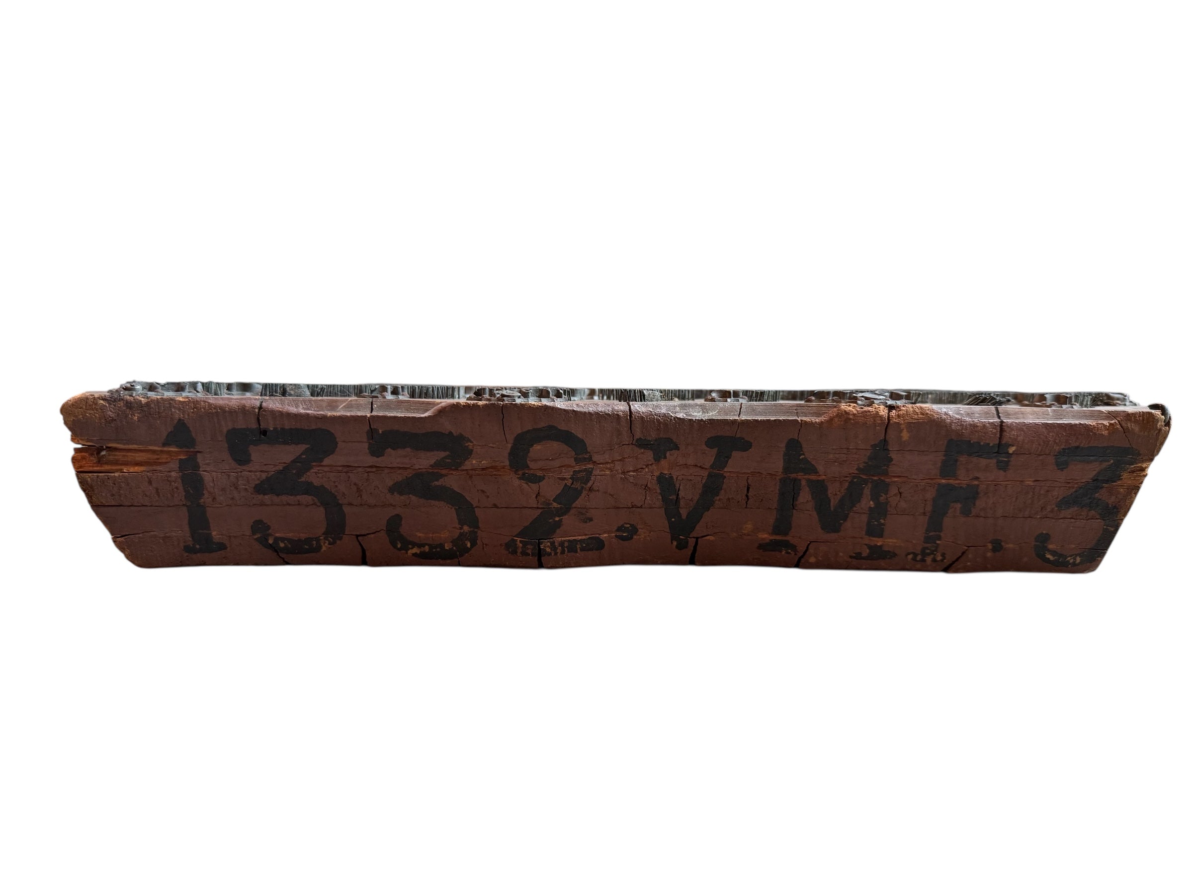 A vintage carved wooden printing block with intricate, repeating patterns, engraved with an unknown artist's signature and stamped "Made in France." The wood shows signs of age and wear, adding to its historical character