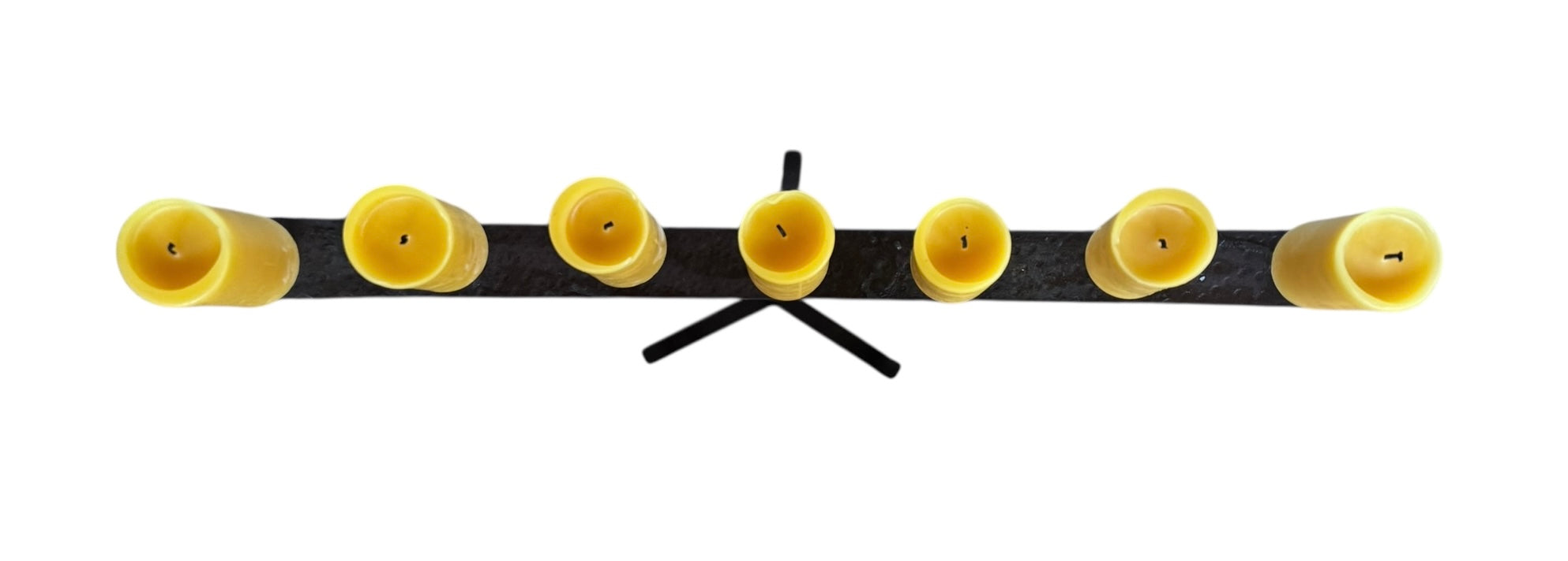  Tall, free-standing Spanish Revival wrought iron candelabra with seven candle prickets holding beeswax candles.