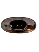 A round, glossy black vase with a small opening.
The vase has a spherical or gourd-like shape and a highly reflective, black glazed finish.