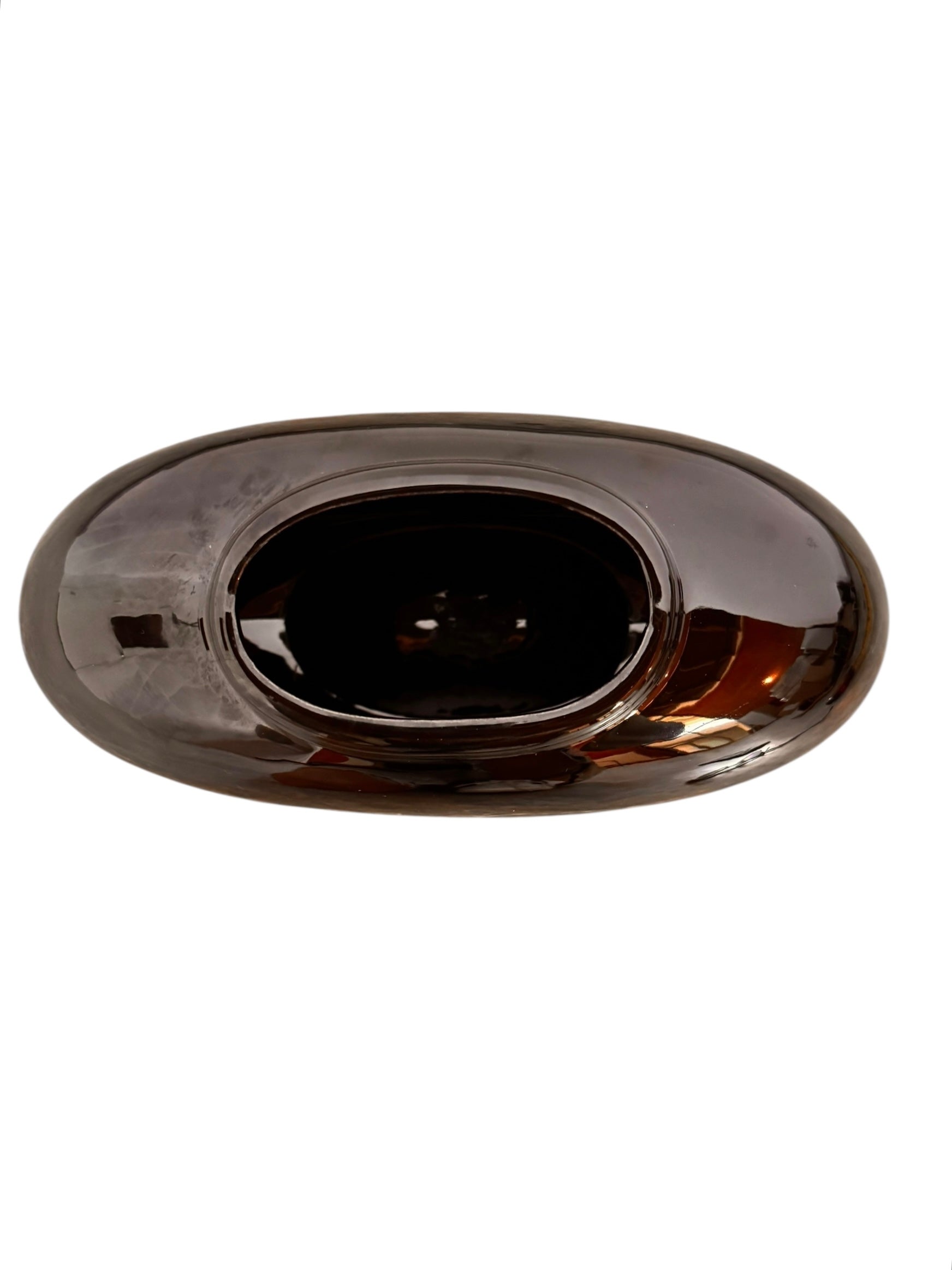 A round, glossy black vase with a small opening.
The vase has a spherical or gourd-like shape and a highly reflective, black glazed finish.