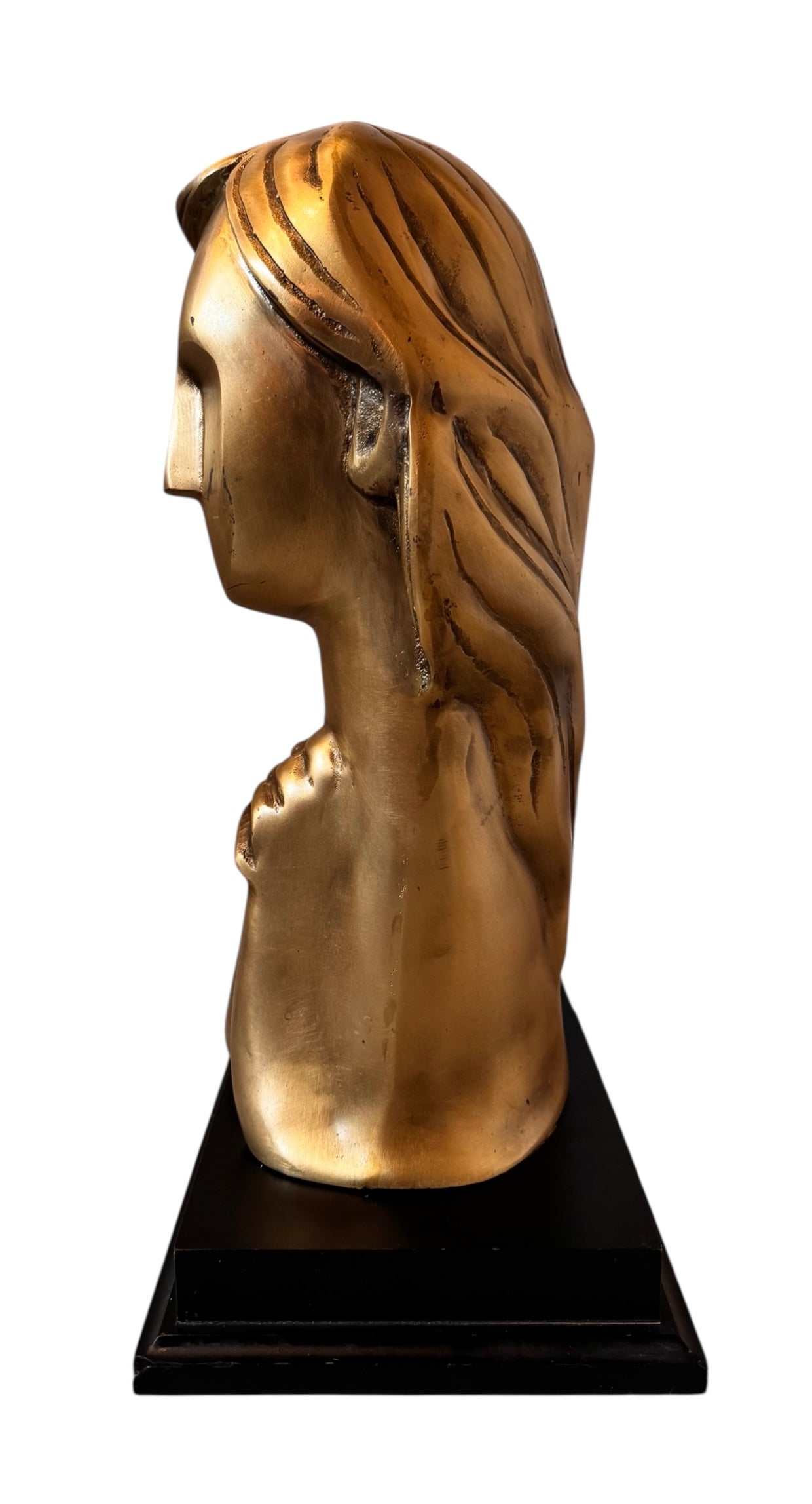 Cast bronze bust of a woman, mid-century Korean design, on a dark wood base. The figure has stylized flowing hair and no mouth.