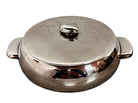 Round St. James silver-plated lidded serving dish from the 1980s, featuring a minimalist modernist design with geometric side handles and a sculptural, biomorphic finial, showing visible vintage wear and pitting on the metallic surface.