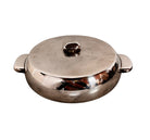 Round St. James silver-plated lidded serving dish from the 1980s, featuring a minimalist modernist design with geometric side handles and a sculptural, biomorphic finial, showing visible vintage wear and pitting on the metallic surface.