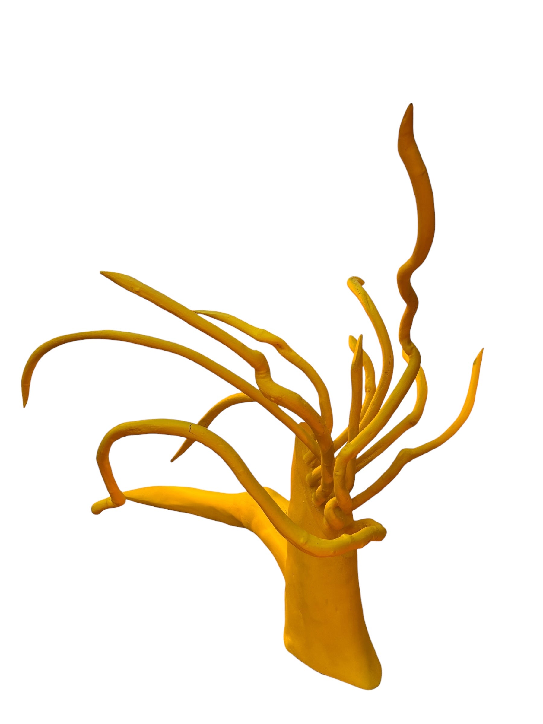A bright yellow abstract sculpture depicting a calamari with a thick base and several thin, curving, branch-like extensions.