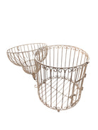 A single, white or cream-colored, decorative wrought iron bird cage with a hinged door and a hanging loop at the top. The cage has a vintage or antique style 