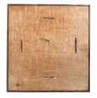 Back of a wooden panel with signature and date