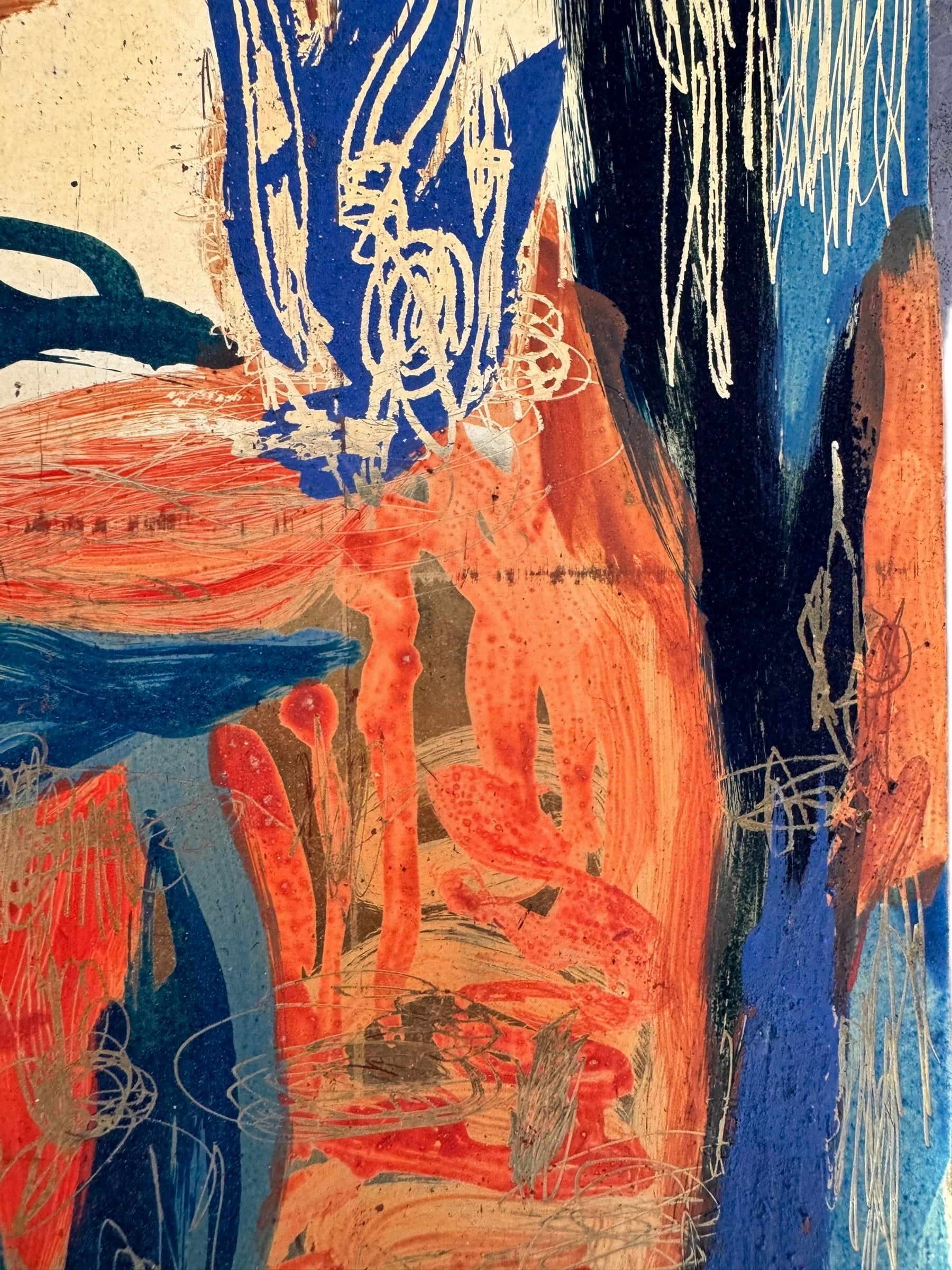 A vertical abstract painting on a shimmering gold-leaf background. The piece is filled with energetic, calligraphic scribbles and fluid shapes in vibrant orange, deep teal, and touches of red. The brushwork varies from thick, opaque strokes to thin, wiry lines that dance across the reflective surface. The composition feels organic and chaotic, like a dense thicket or a fire.