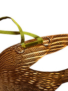 mage of a vintage-style, gilded tin bird with embossed feather detailing. A green velvet ribbon is attached. Front and back views shown.