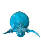 Glossy turquoise ceramic Ankole-Watusi sculpture with long, stylized horns and a nose ring.