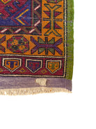 Anatolian Yastik rug with red, gold, green and gray geometric patterns and fringe.
