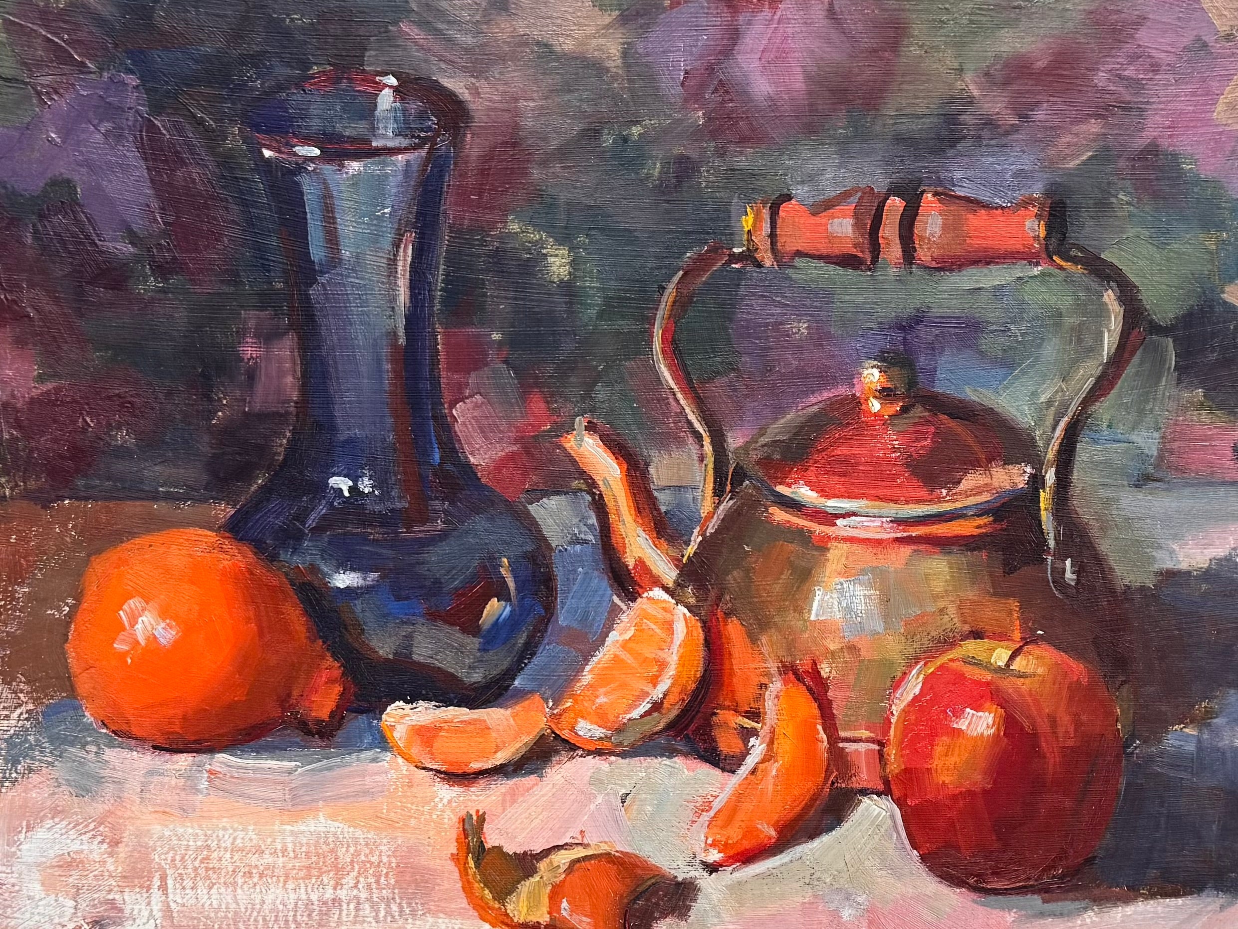 An oil painting still life featuring a copper teapot with a wooden handle, a blue glass vase, a red apple, a whole orange, and several orange slices, all arranged on a white tablecloth against a blurred purple and green background. The artist's signature "B. Willamson 2019" is visible in the bottom right corner.