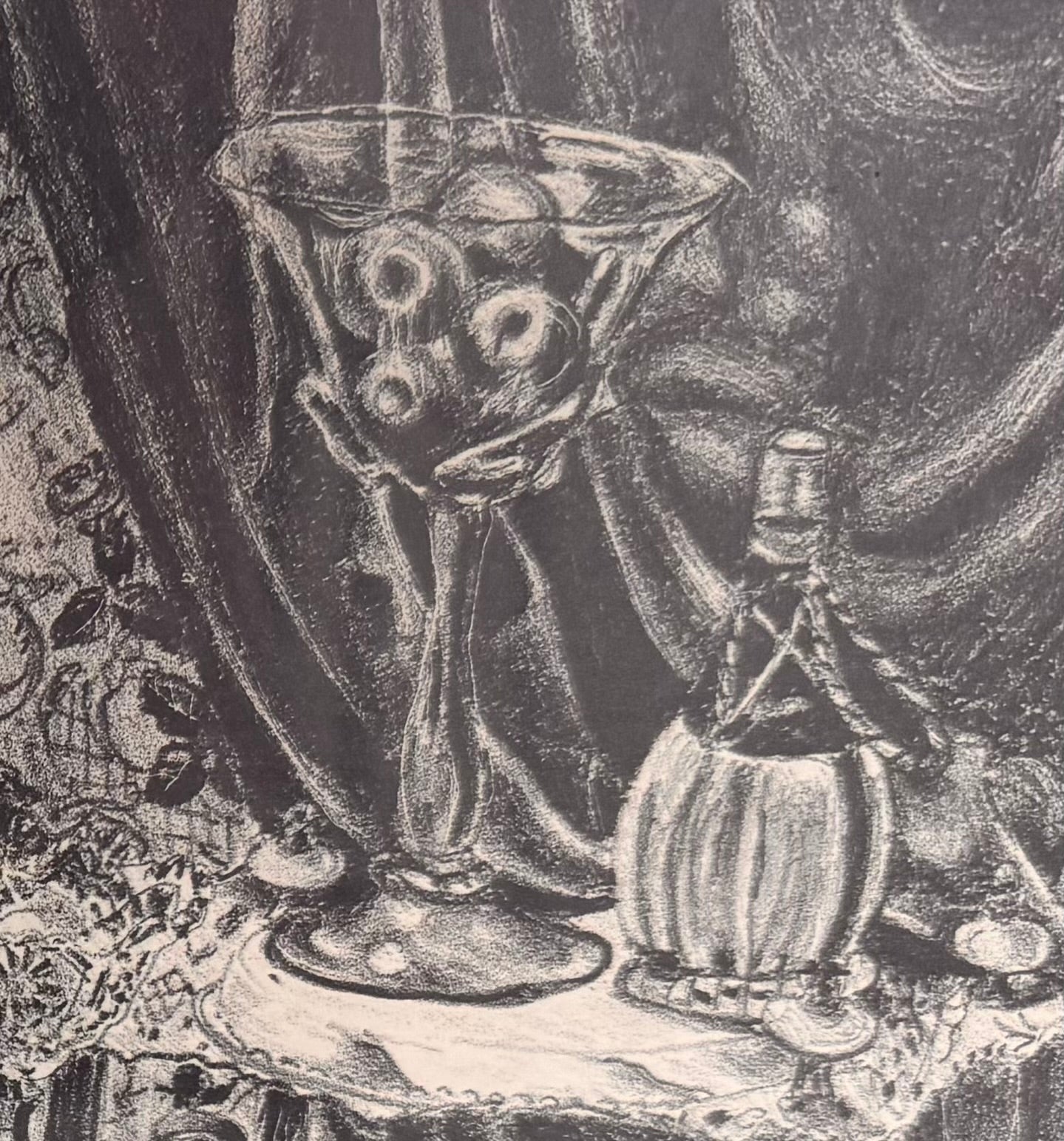 A black-and-white lithograph titled Victoria by the artist Zsissly. A woman with a veil over her dark hair sits directly facing the viewer behind a highly detailed, round dining table crowded with objects. Every inch of the scene is densely textured, depicting a bowl of bananas and grapes, an ice bucket with wine bottles, crystal glassware, a decanter, and a patterned lace tablecloth. The background features intricate floral wallpaper, a paneled door, and heavy drapes. The style is eerie and densely shaded 