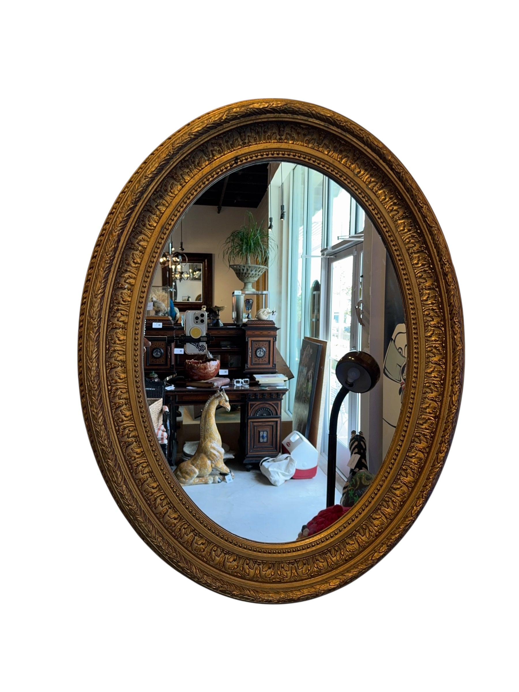 French oval mirror with elegant gold frame. Classic design with refined vintage charm, excellent condition.