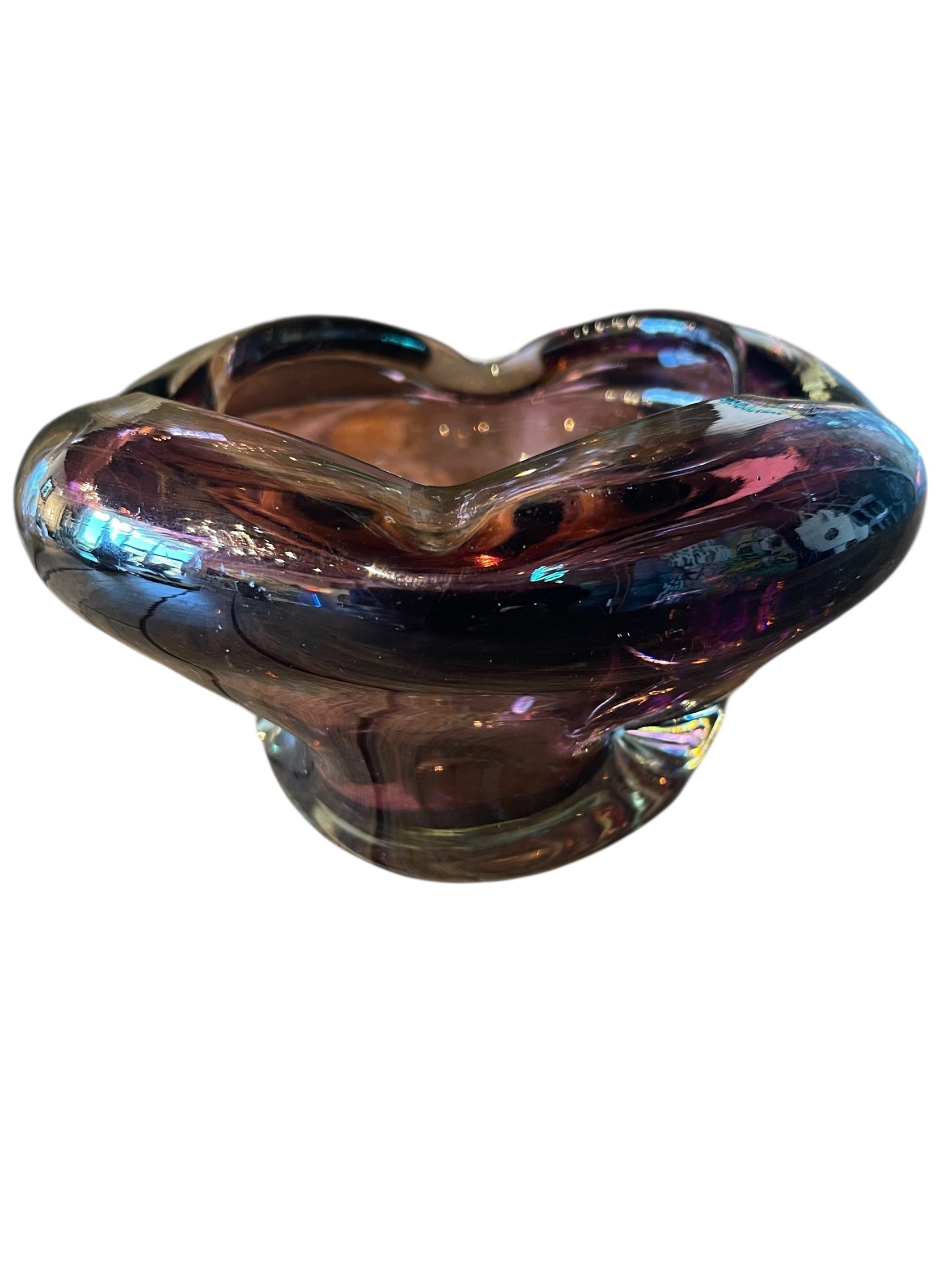Amethyst Murano glass ashtray in a petal shape with indentions, a vintage design object.