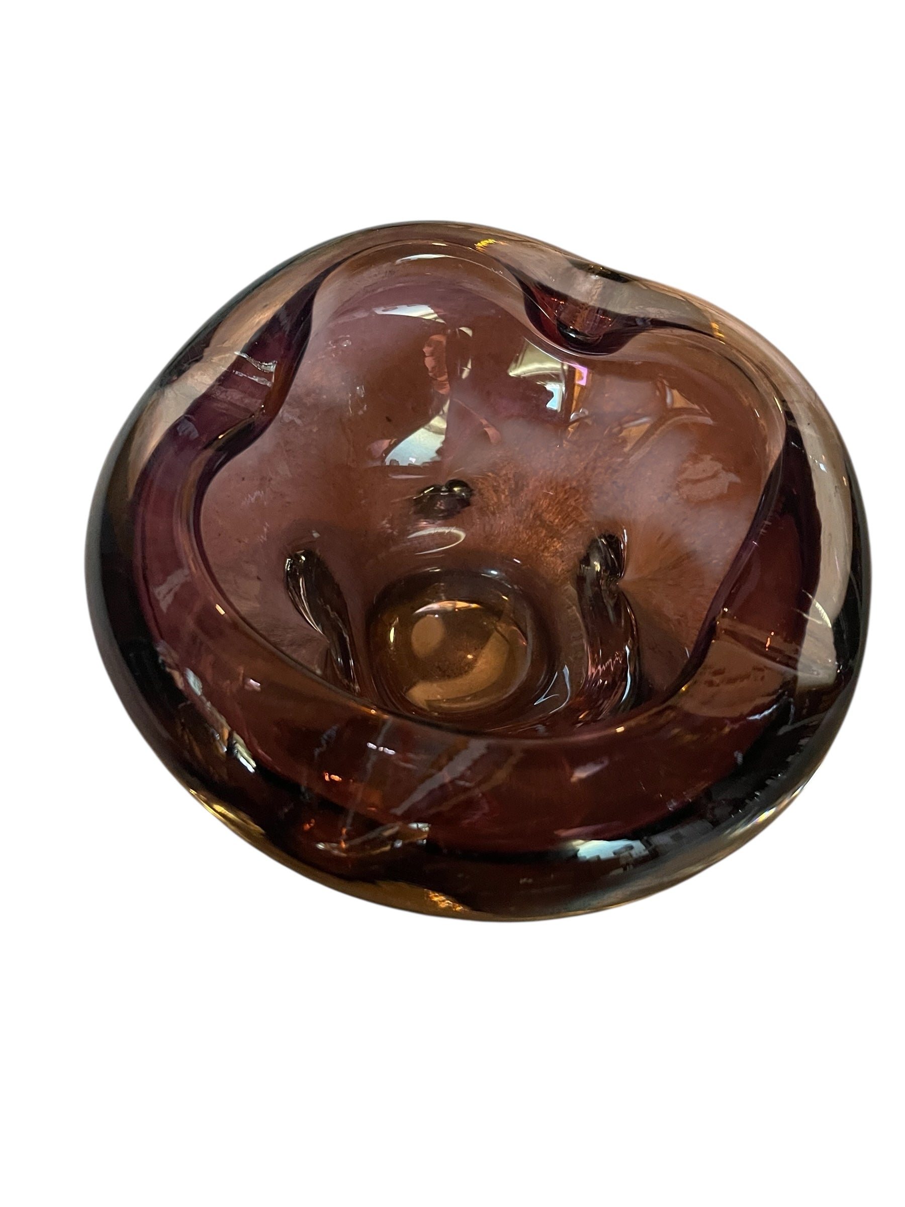 Amethyst Murano glass ashtray in a petal shape with indentions, a vintage design object.