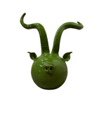 Glossy green ceramic pig sculpture with exaggerated, upward-curving horns and a snout. From Italy. Enza Fasano. Ceramic.
Il_Suino_Cornuto_by_Enza_Fasano_Ceramiche