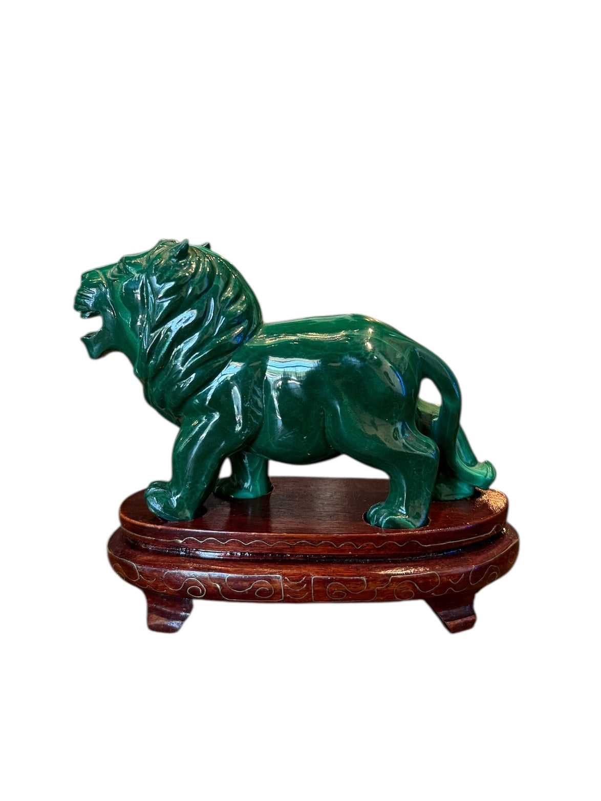 Polished Malachite Lion on Wooden Stand 
Malachite Sculpture with Stand for Decor 
Malachite Lion Art on Display Stand 
Powerful Malachite Lion Sculpture - Design Object 
Geometric Malachite Sculpture - Lion
Striking Malachite Animal Sculpture: Lion 
Malachite Guardian: Lion Sculpture
