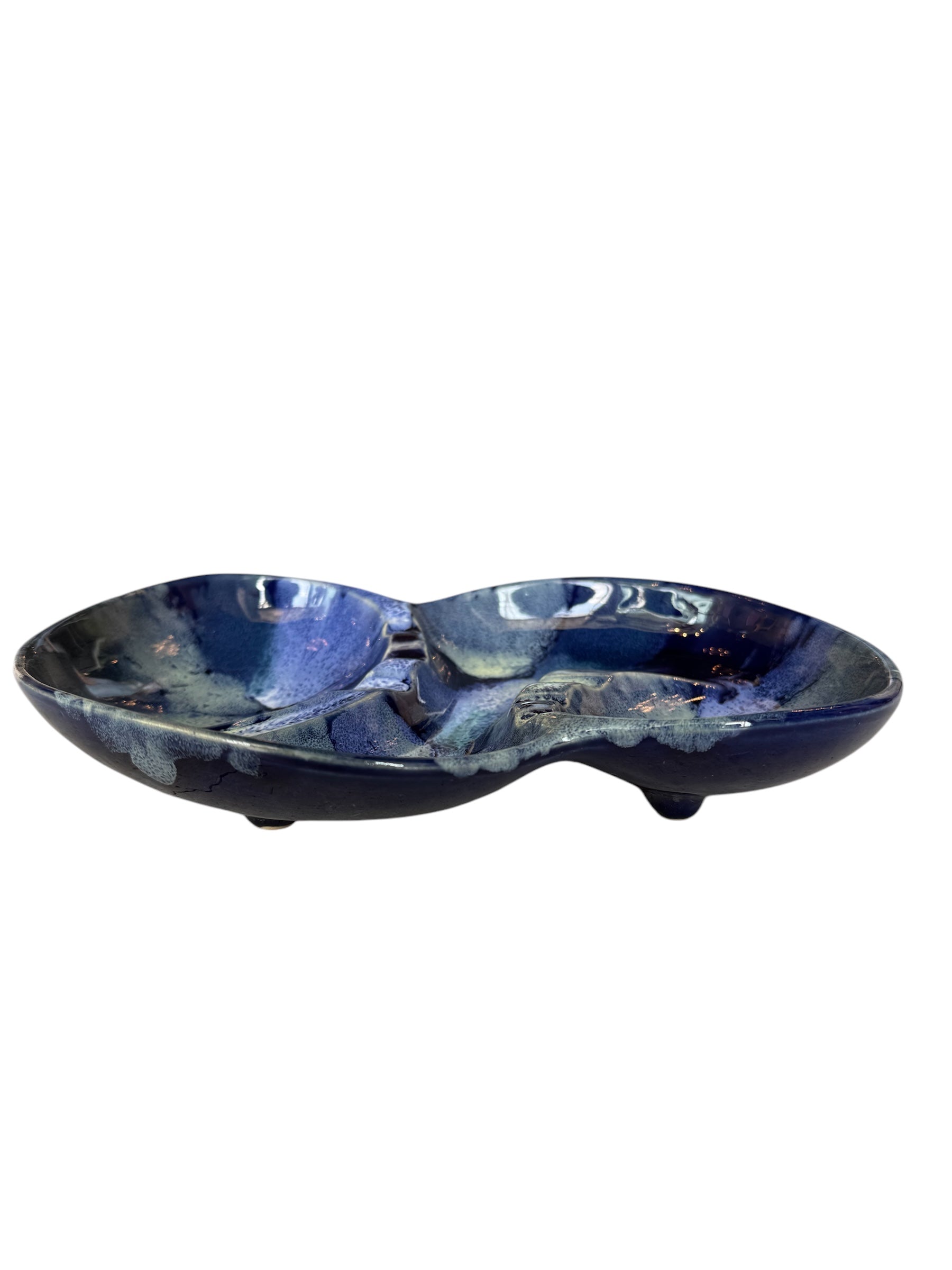 Vintage McCoy ashtray. Glazed in dark blue and marbled with lighter blues. The bottom is stamped 'McCoy USA.'"
McCoy_Midnight_Bloom_Ashtray_A_Vintage_American_Treasure