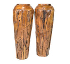 A pair of tall, brown, handmade teak wood floor vases with mosaic live edge pieces, showcasing natural wood grains