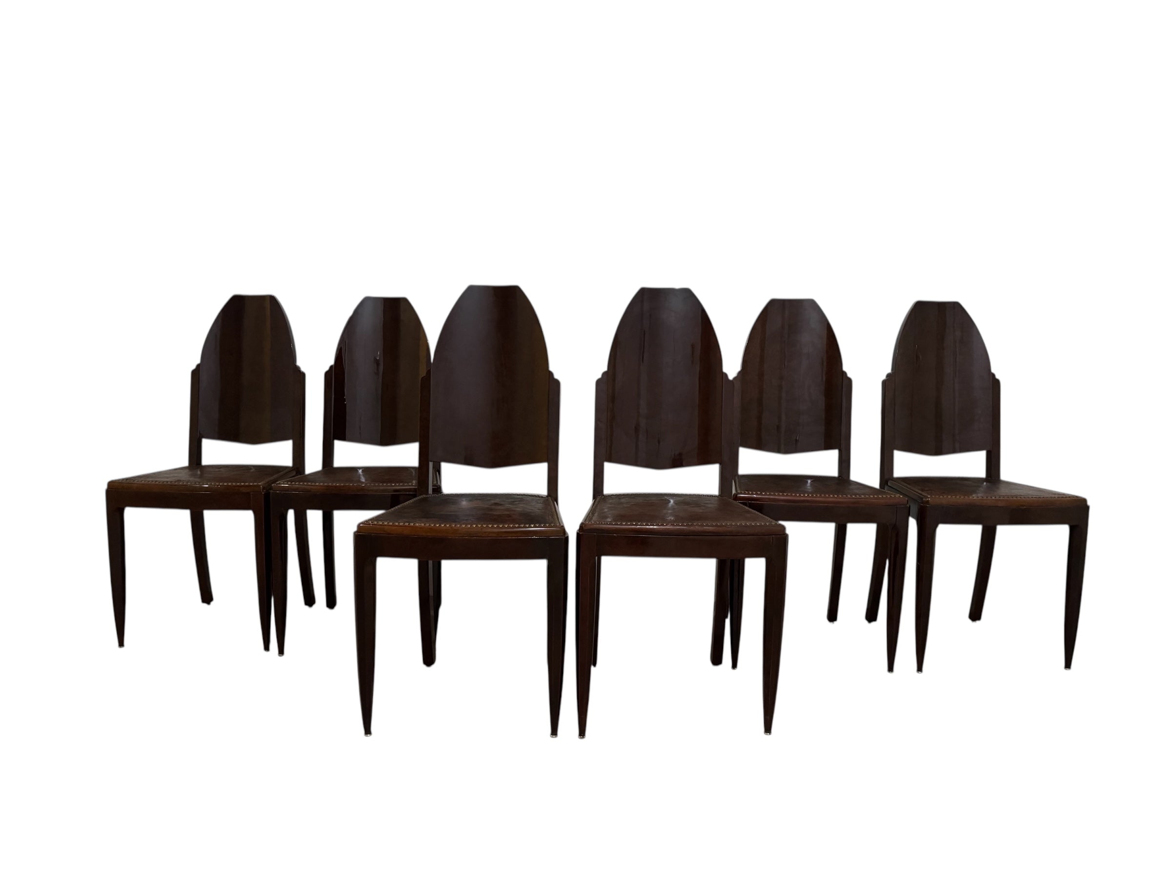  Art Deco chair featuring the leather upholstery, nail head trim, and mahogany frame.
Set of Six French Art Deco Mahogany Dining Chairs
